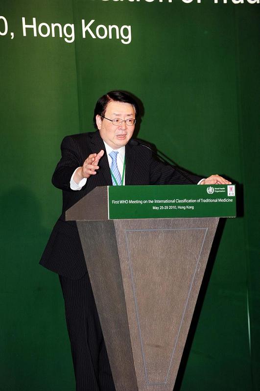 The Director of Health, Dr PY Lam, delivers a speech at the opening ceremony of the meeting.