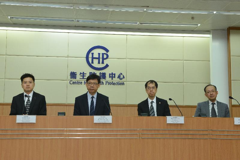 The Controller of the Centre for Health Protection of the Department of Health, Dr Leung Ting-hung (second left), again urges travellers to avoid unnecessary travel to affected countries at a press conference after the interdepartmental meeting.