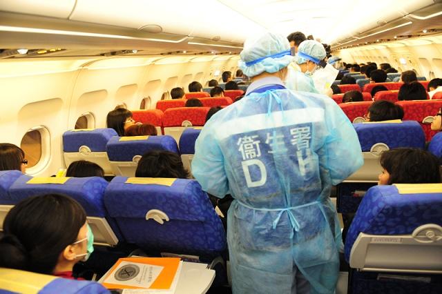 During ”Exercise Hua Shan”, Duty Port Health Officers assessed the health condition of other passengers and crew.