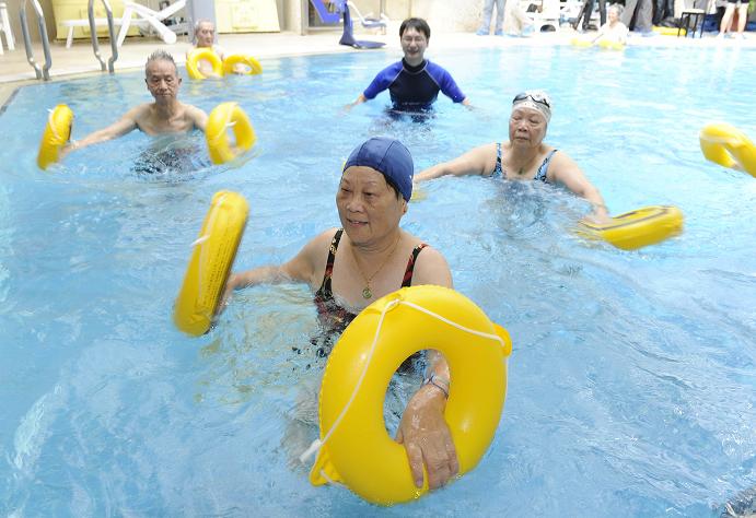 Demonstration of aquatic exercises by elders.