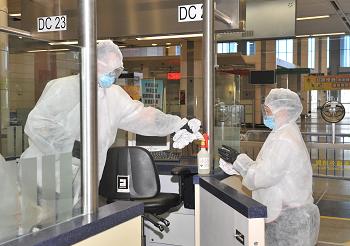 Exercise Jasper: Disinfection of the immigration counter at Hong Kong Shenzhen Bay Port after departure of the index patient and close contacts.