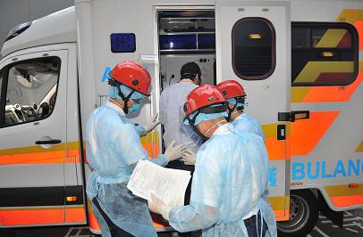 Exercise Jasper: The ambulance carrying the two close contacts just before leaving for further medical examination at a Hong Kong hospital.