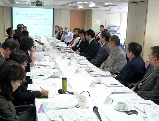 The Controller of the Centre for Health Protection of the Department of Health, Dr Leung Ting-hung (fifth right), chairs the second inter-departmental meeting today (March 13) to brief various government departments on the latest situation regarding the overseas infection as well as to remind them to prepare for Severe Respiratory Disease associated with novel coronavirus and other novel infectious diseases.