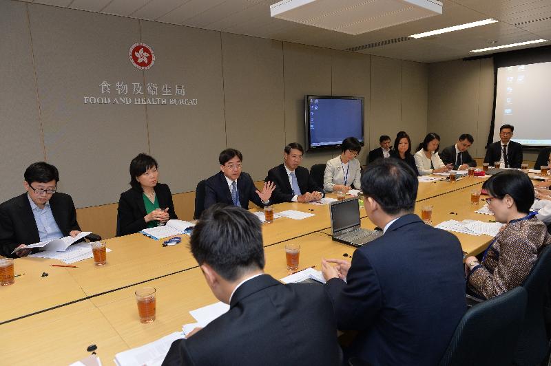 The Secretary for Food and Health, Dr Ko Wing-man (third left), chairs an interdepartmental meeting on infectious disease this morning (October 20) on the latest local risk assessment and prevention and control measures.