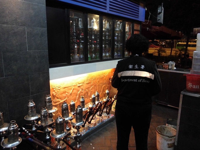 Tobacco Control Inspectors conduct an inspection at a bar which provides waterpipe for smoking.